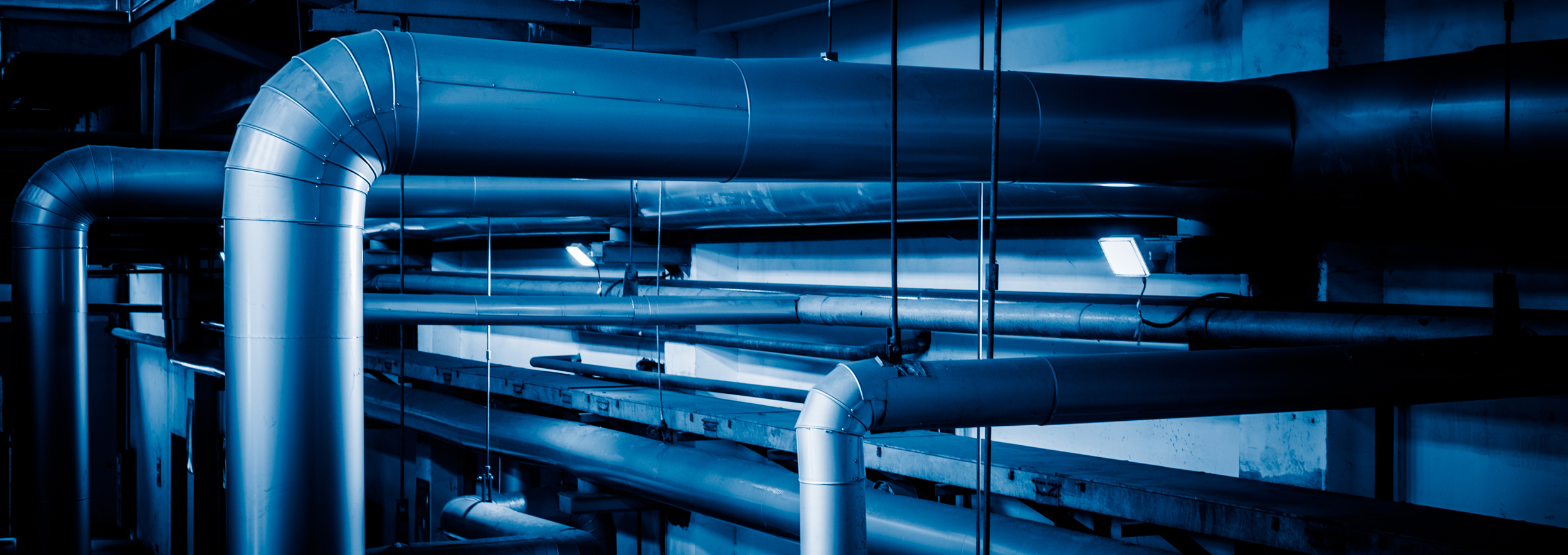 steel pipelines and cables in a plant,Industrial zone.